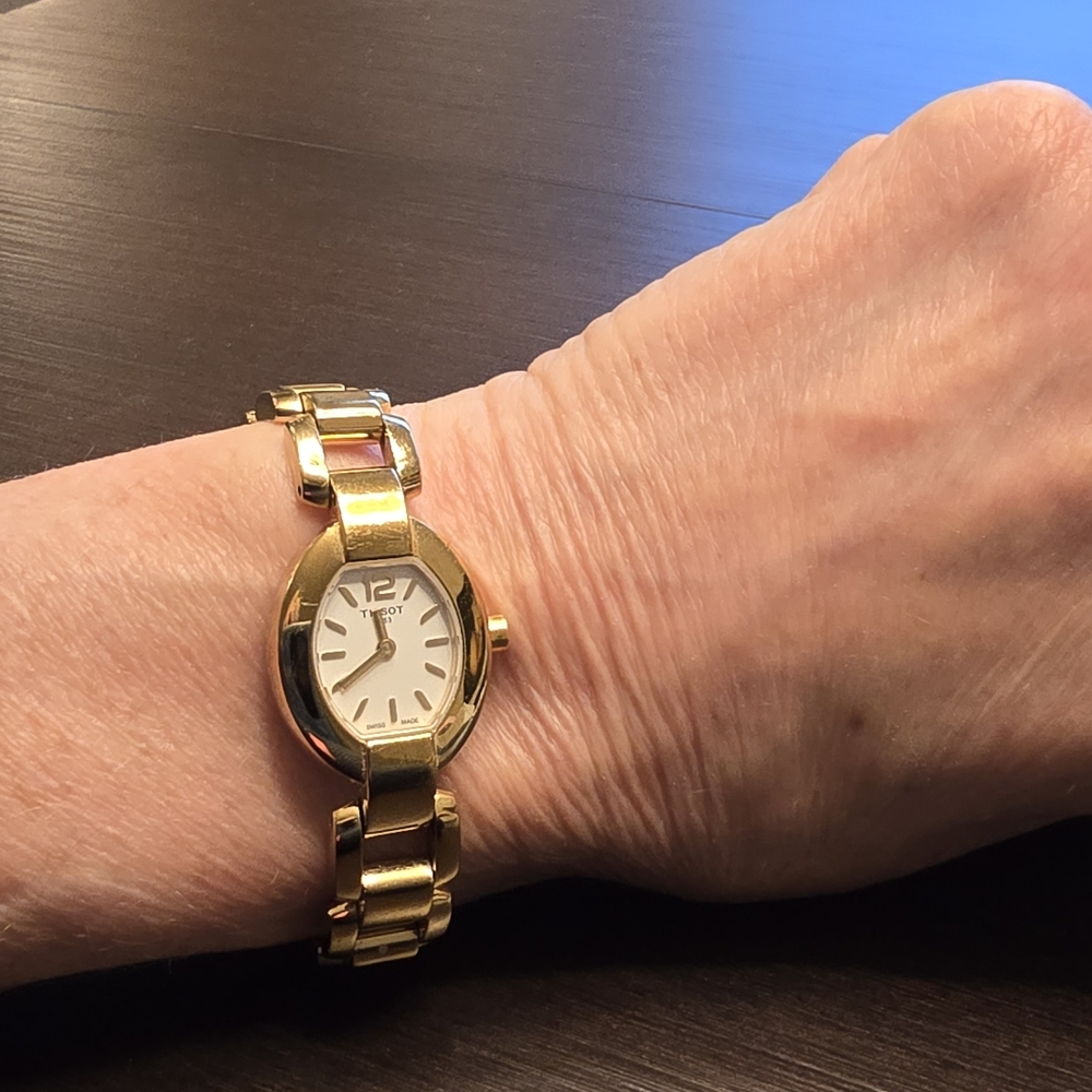 Tissot Gold Watch with White Dial